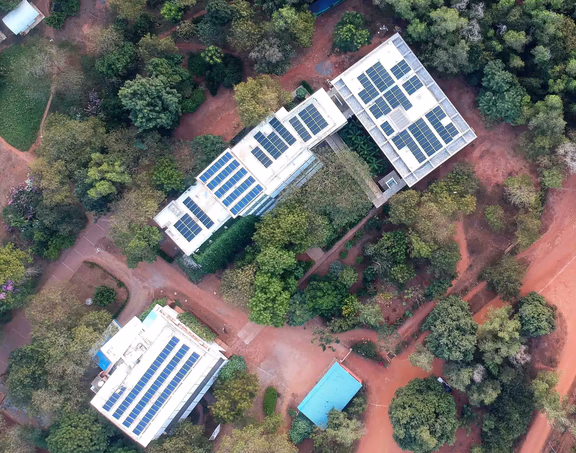 Rooftop solar panels on the offices of the Auroville Foundation, SAIIER and the Auroville Archives buildings