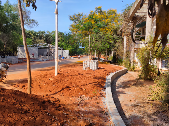 The Crown Road nearby Kalpana community. A retaining wall is being built to prevent earth from the roadside flushing into Kalpana
