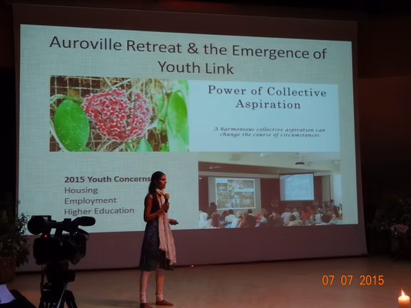Kavitha presenting Auroville at the Global Ecovillage Network Summit in Scotland