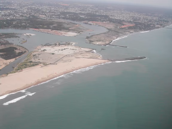 Sand has accumulated south of the Pondicherry harbour entrance, the beaches north have disappeared