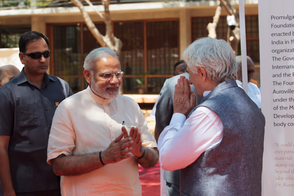 Prime Minister Narendra Modi greets Claude Arpi, Febraury 2018