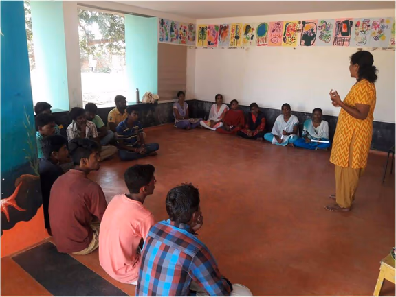 Devi giving career guidance to students