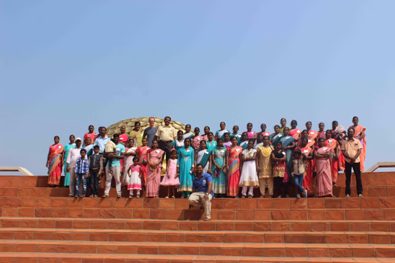 Women from Annai Nagar accompanied by Aurovlians working at Auroville Village Action and the Joy of Learning visiting the Matrimandir