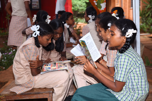Bioregion students immersed in reading at the Book Fair