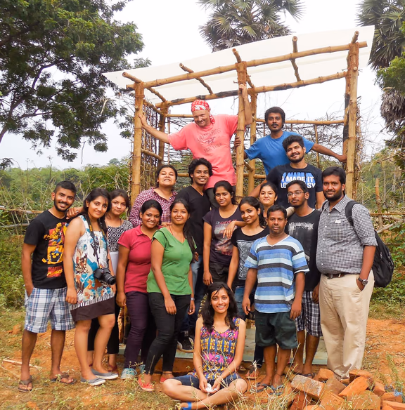 Participants of the Auroville World Bamboo Day in front of the prototype bamboo toilet