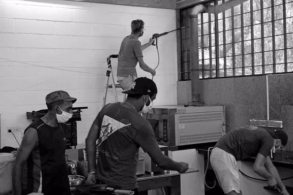 Aurovilians sanitize one of the community kitchens