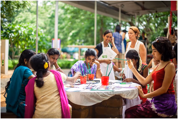 Adults and children at work during Art Break Day