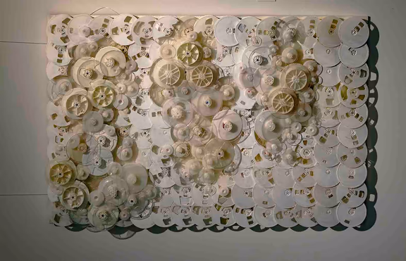 4 Installation made from discarded dvd wheels and plywood